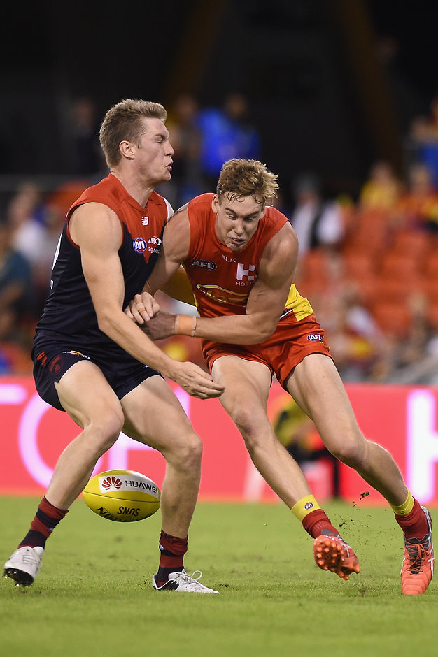 AFL 2016 Rd 07 - Gold Coast v Melbourne GOLD COAST, AUSTRALIA - MAY 7: Tom Lynch of the Suns competes for the ball against Tom McDonald of the Demons during the 2016 AFL Round 07 match between the Gold Coast Suns and the Melbourne Demons at Metricon Stadium, Gold Coast on May 7, 2016. (Photo by Matt Roberts/AFL Media)